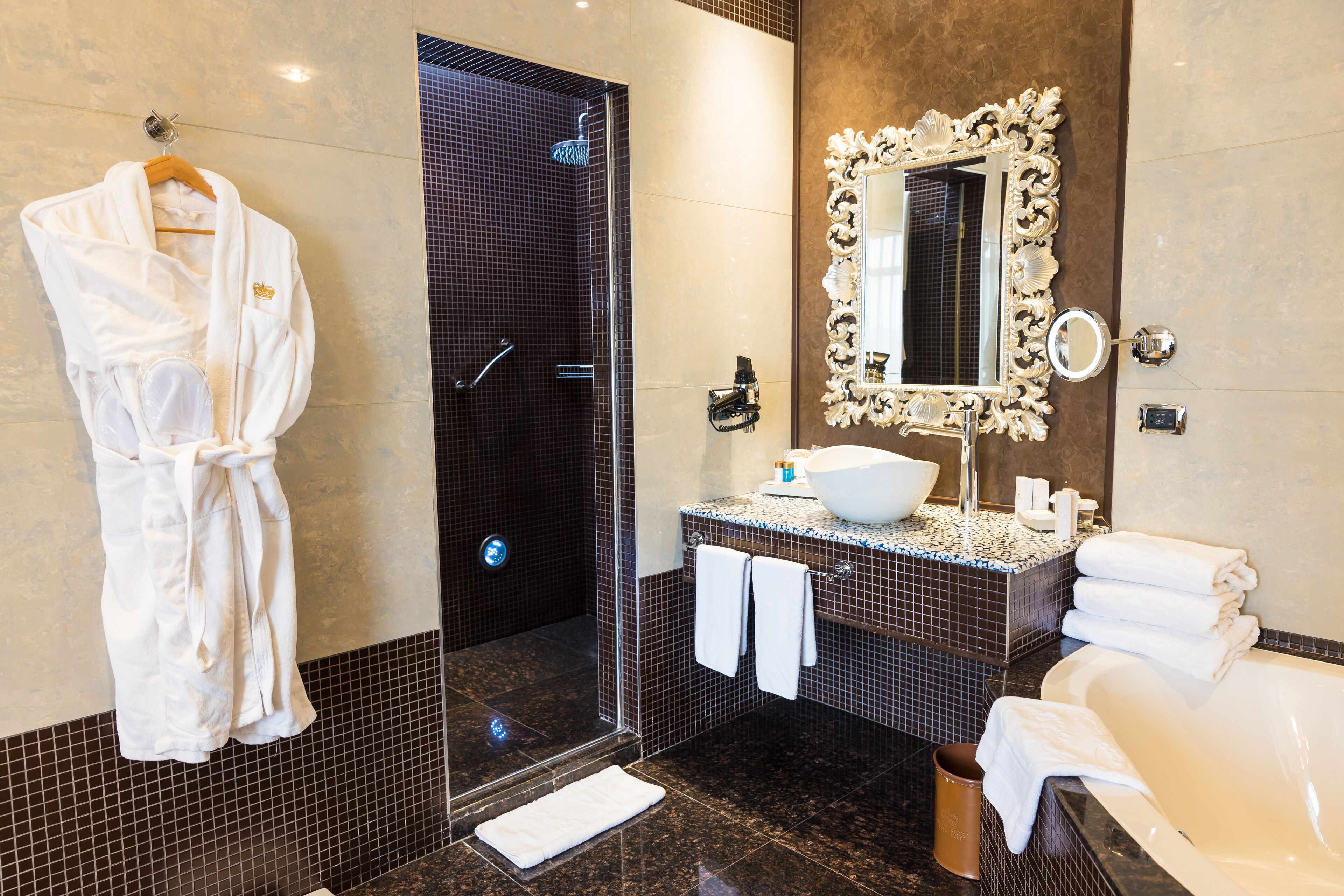 junior suite with balcony | bathroom | separate bathtub and shower, rainfall showerhead, designer toiletries
