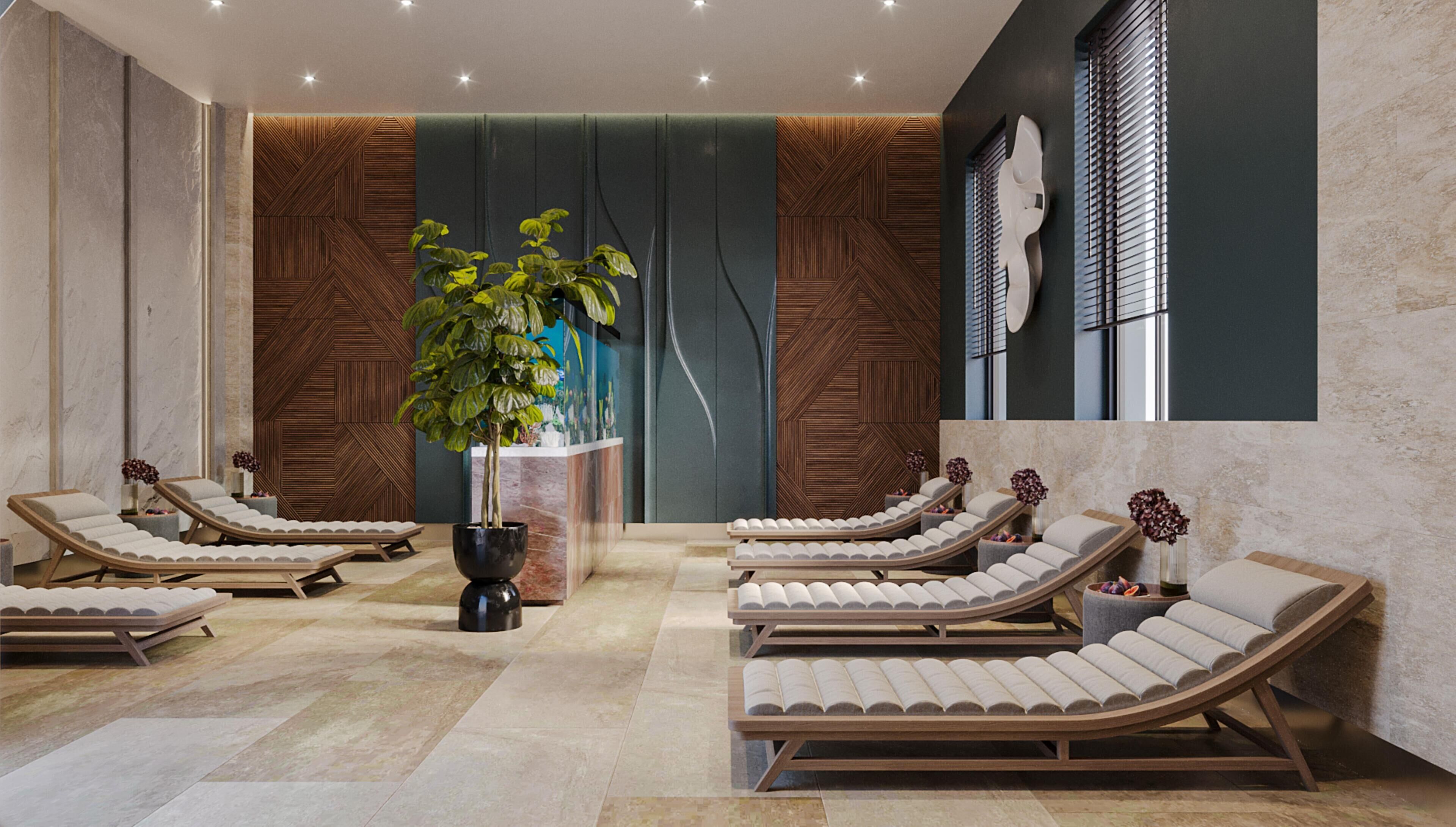 A spa area with multiple sun loungers, a large potted plant, and a wall with geometric patterns.