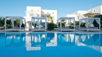 Outdoor pool, pool umbrellas, sun loungers