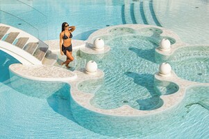 Indoor pool, 2 outdoor pools, pool umbrellas, sun loungers