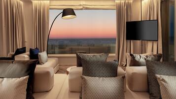 Suite Luxury | Area soggiorno | Smart TV 50 pollici con canali via cavo