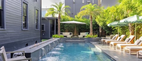 Outdoor pool, pool umbrellas, sun loungers
