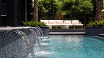 Outdoor pool, pool umbrellas, sun loungers