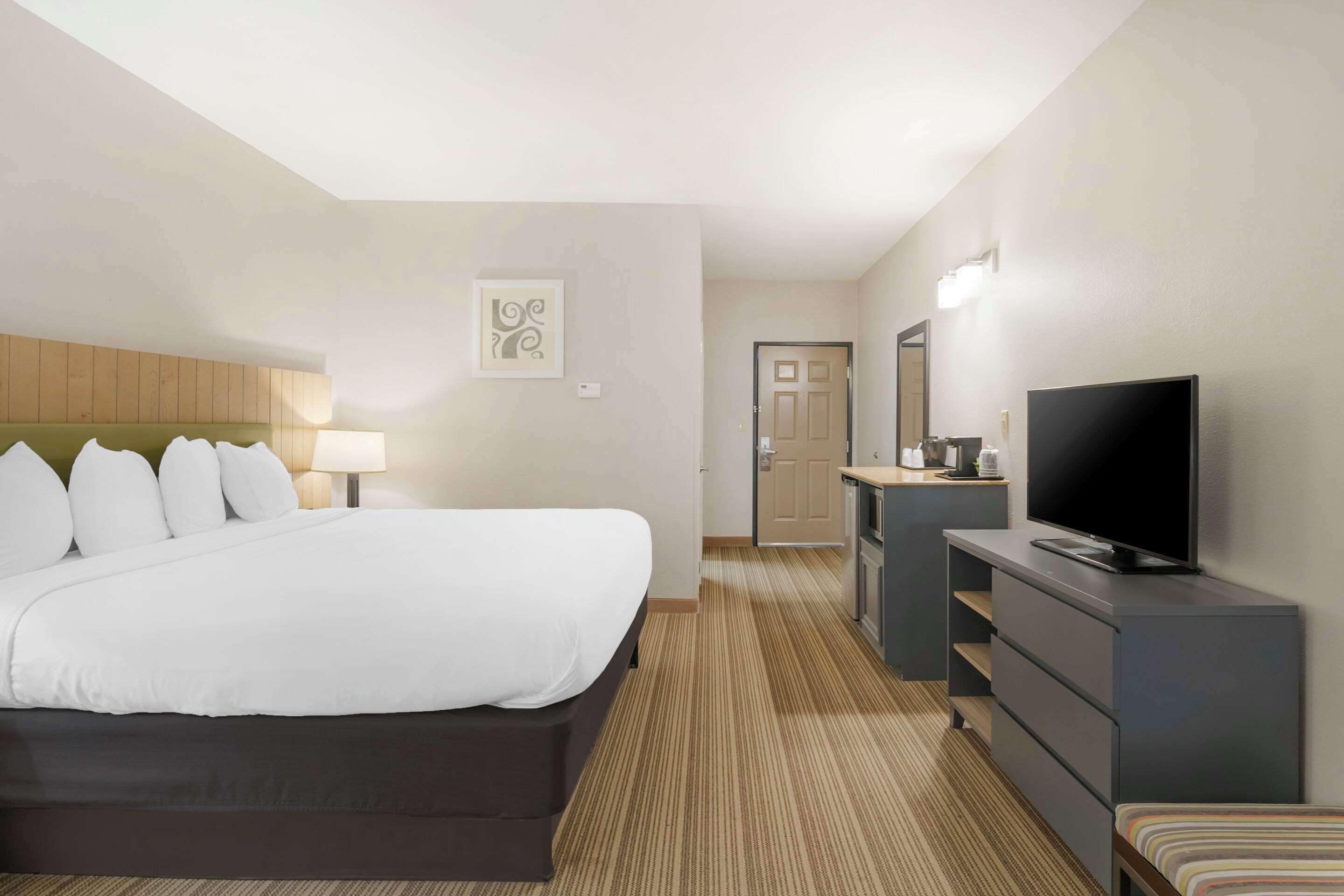 room, 1 king bed, non smoking | premium bedding, desk, iron/ironing board, free cots/infant beds