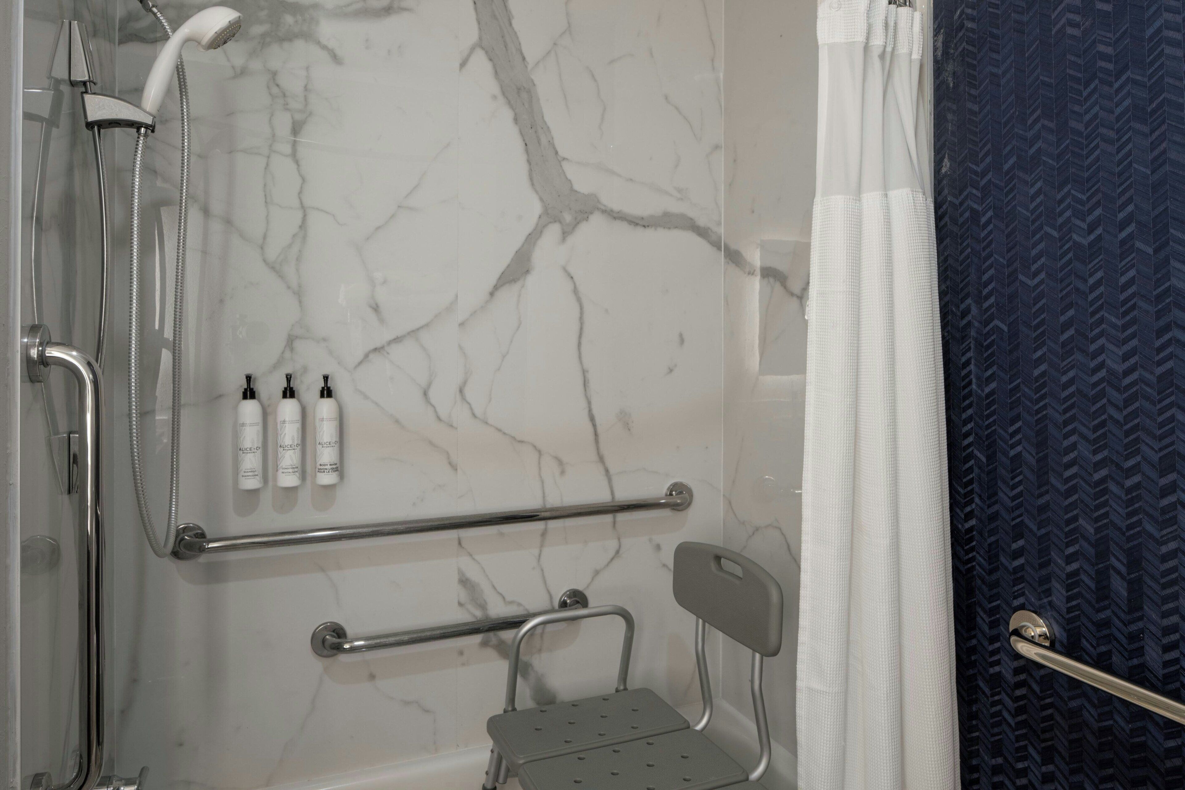 combined shower/bathtub, free toiletries, hair dryer, towels