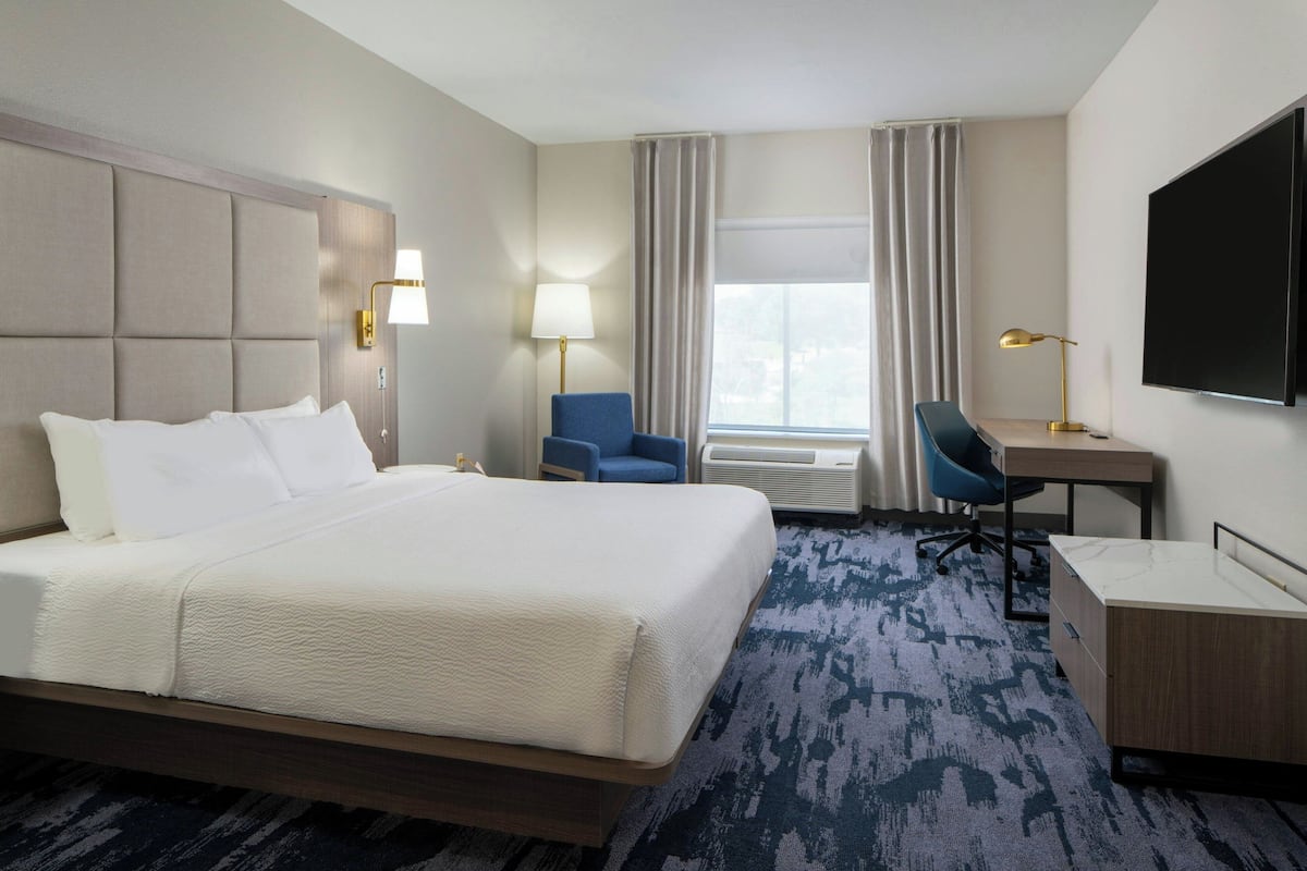 hypo-allergenic bedding, pillow-top beds, in-room safe, desk