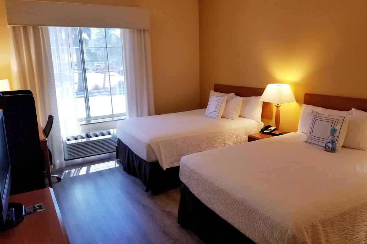 Premium bedding, pillow-top beds, in-room safe, desk