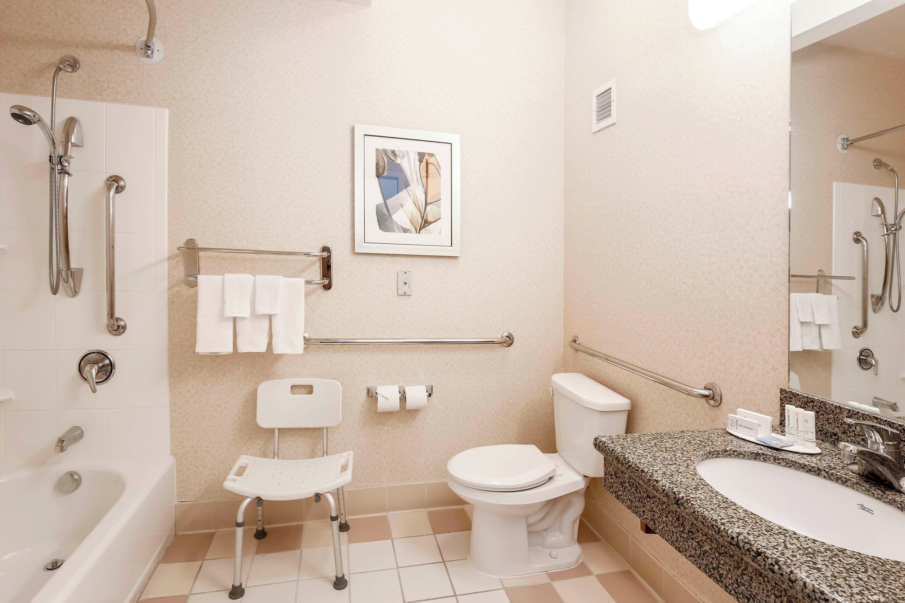 room, 1 king bed | bathroom | combined shower/bathtub, free toiletries, hair dryer, towels