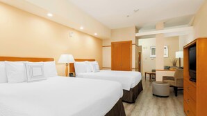 A hotel room with two beds, a desk, a chair, a television, and a wardrobe. - Fairfield Inn & Suites Temecula by Marriott (Temecula)