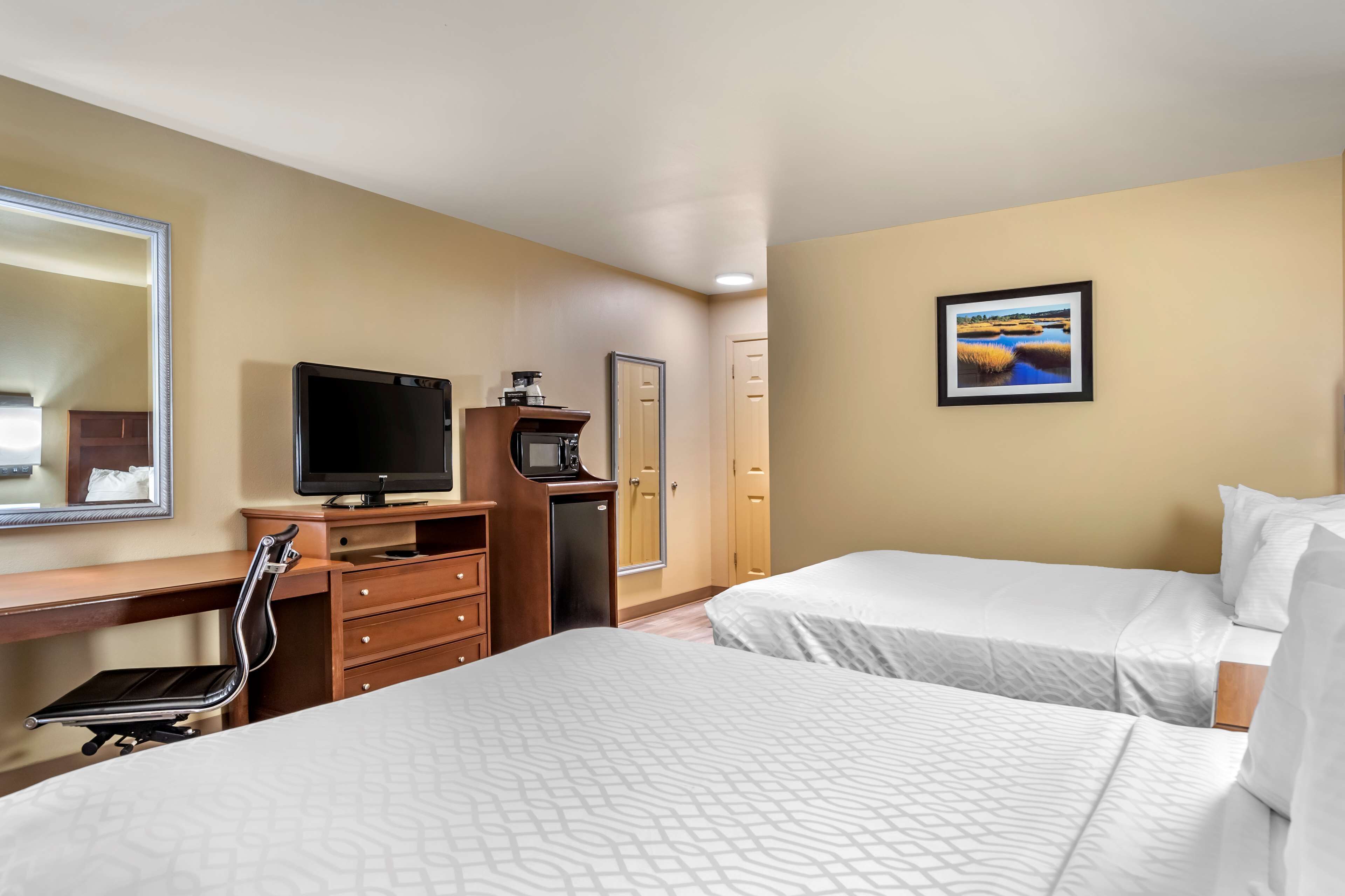 premium bedding, desk, laptop workspace, iron/ironing board