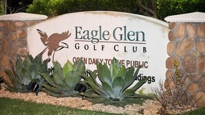 A sign for Eagle Glen Golf Club stating it is open daily to the public. - Holiday Inn Express & Suites Corona by IHG (Corona)