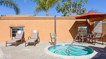 Outdoor pool, open 9:00 AM to 10:00 PM, sun loungers