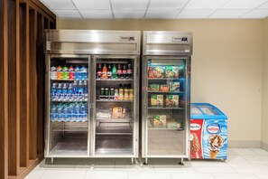A vending machine with various beverages and snacks. - Holiday Inn Express & Suites St. George North - Zion by IHG (Washington)
