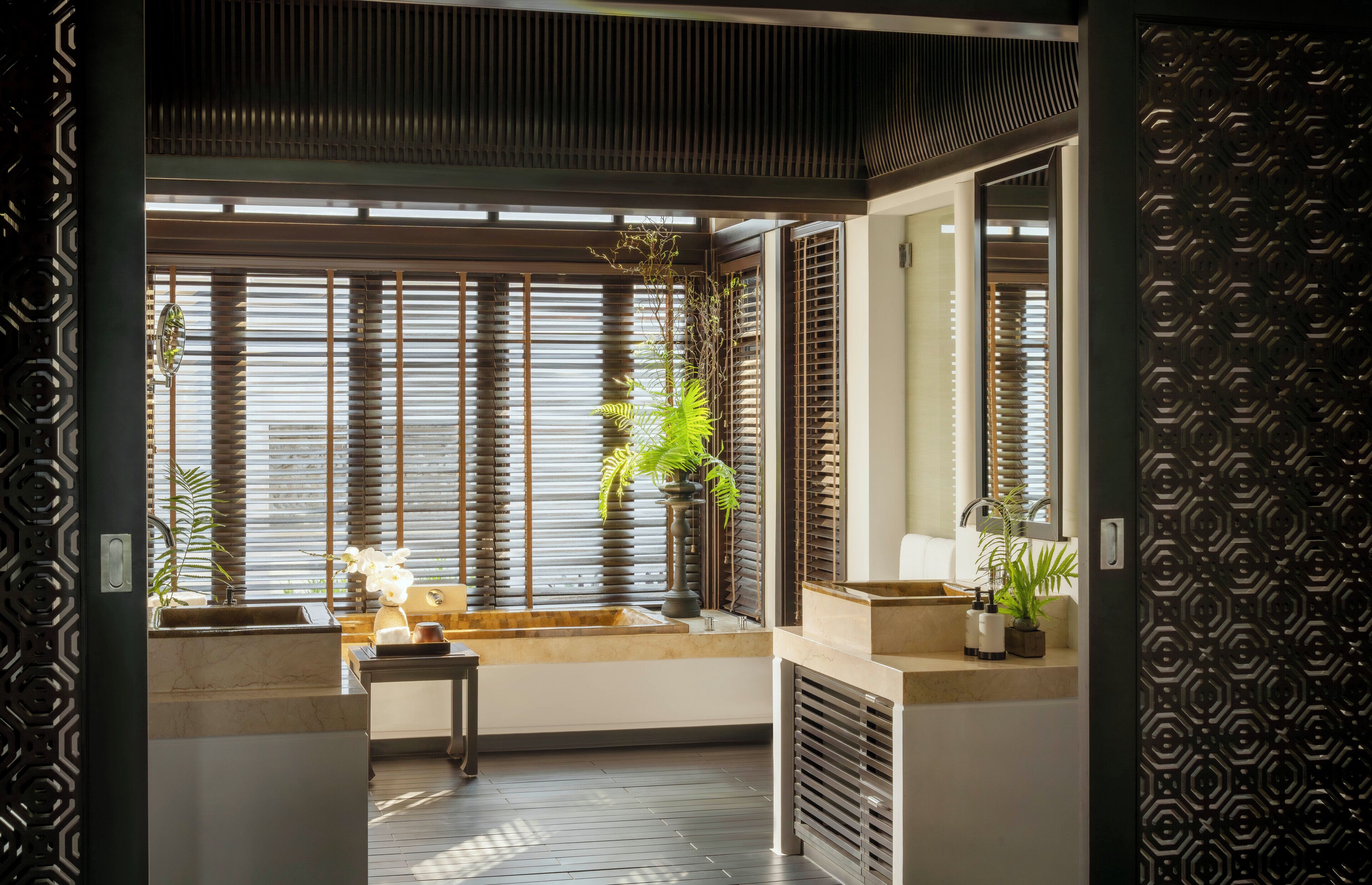 separate bathtub and shower, rainfall showerhead, designer toiletries