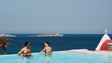 Seasonal outdoor pool, pool umbrellas, sun loungers