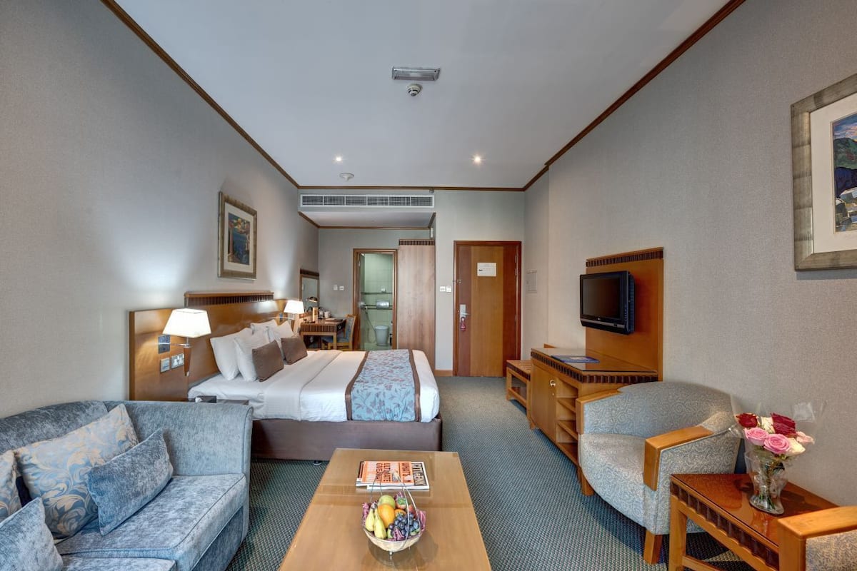 One Bedroom Suite | Premium bedding, in-room safe, desk, laptop workspace