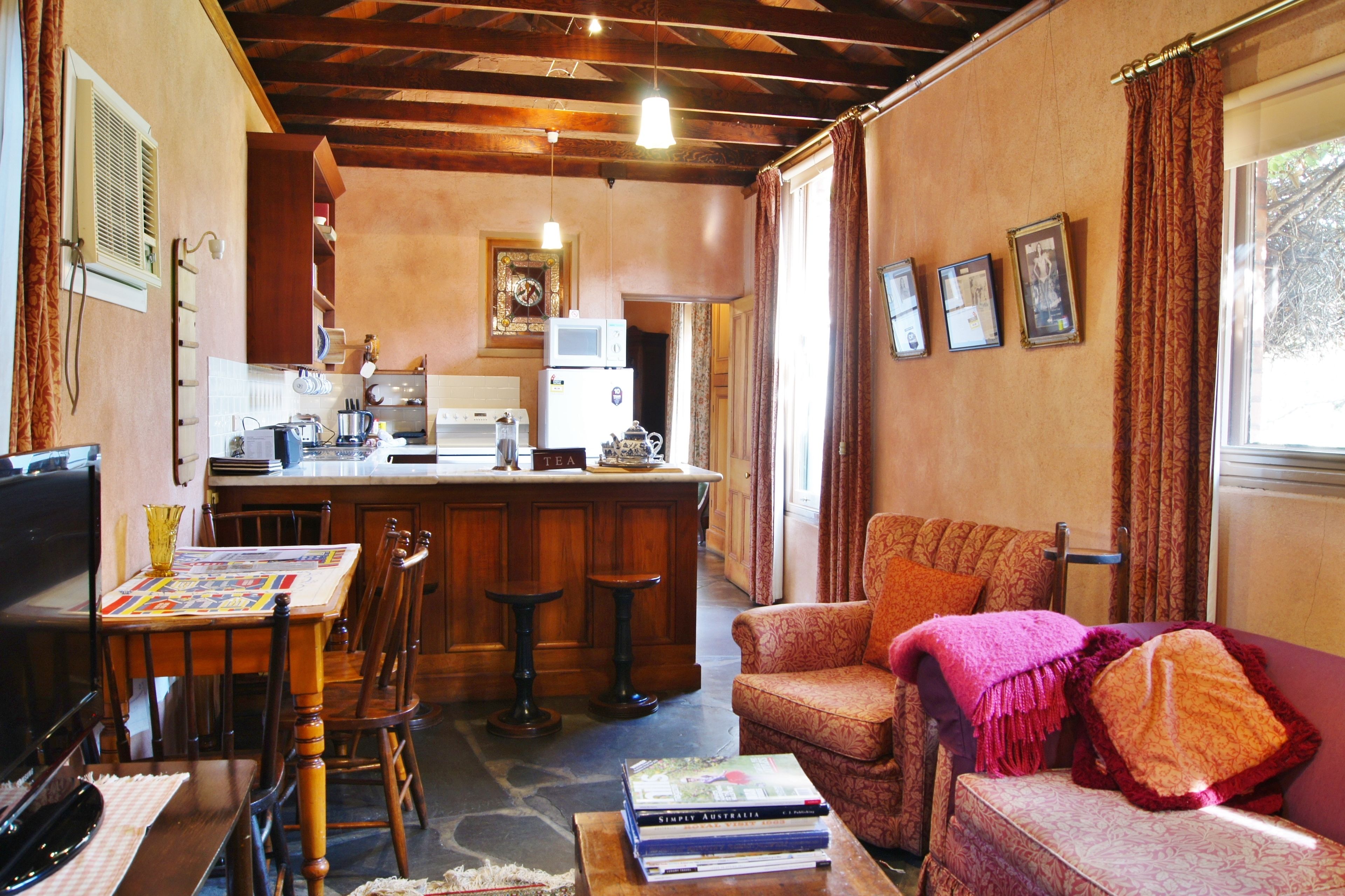 paprika spa cottage | living area | tv, dvd player