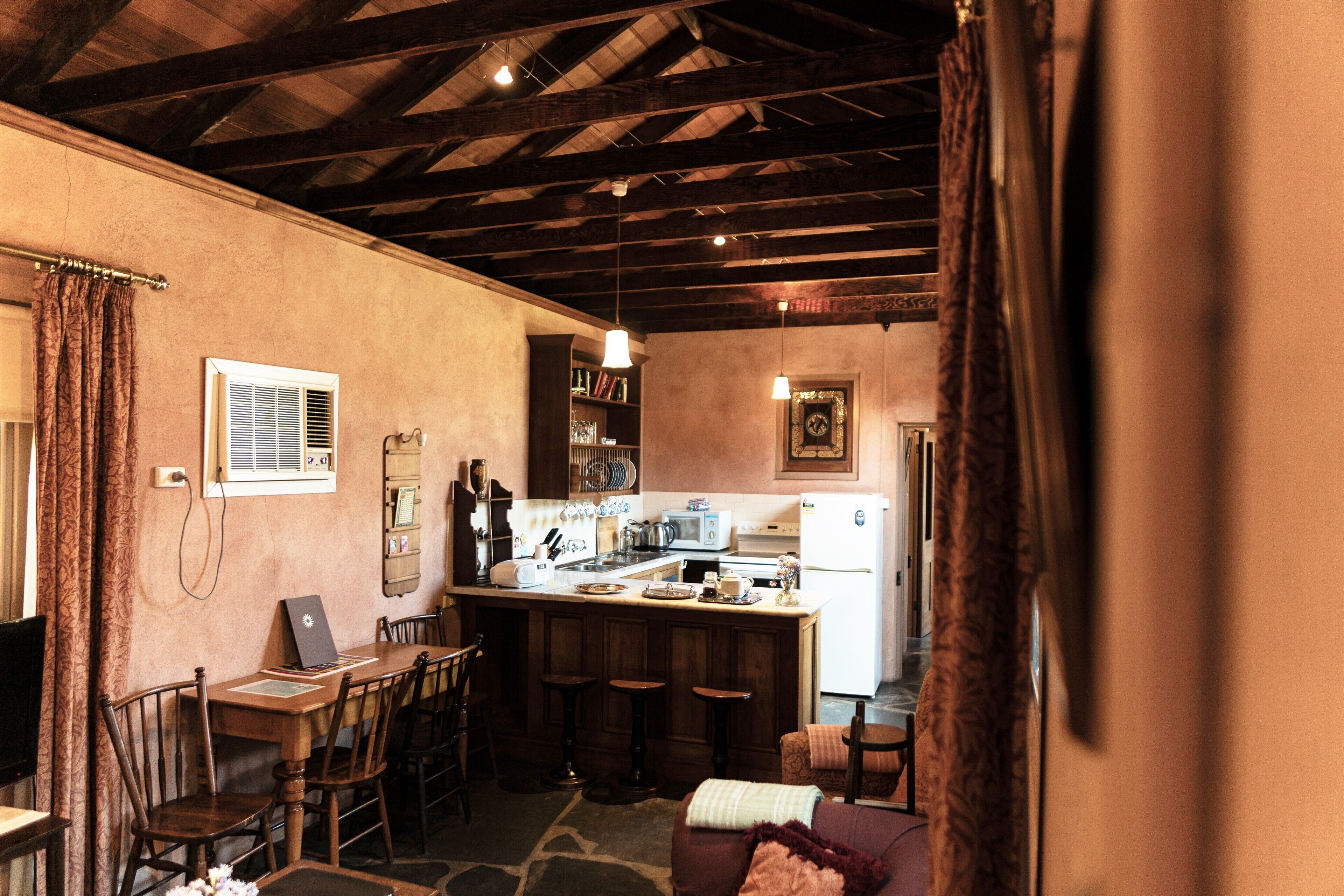 paprika spa cottage | living area | tv, dvd player