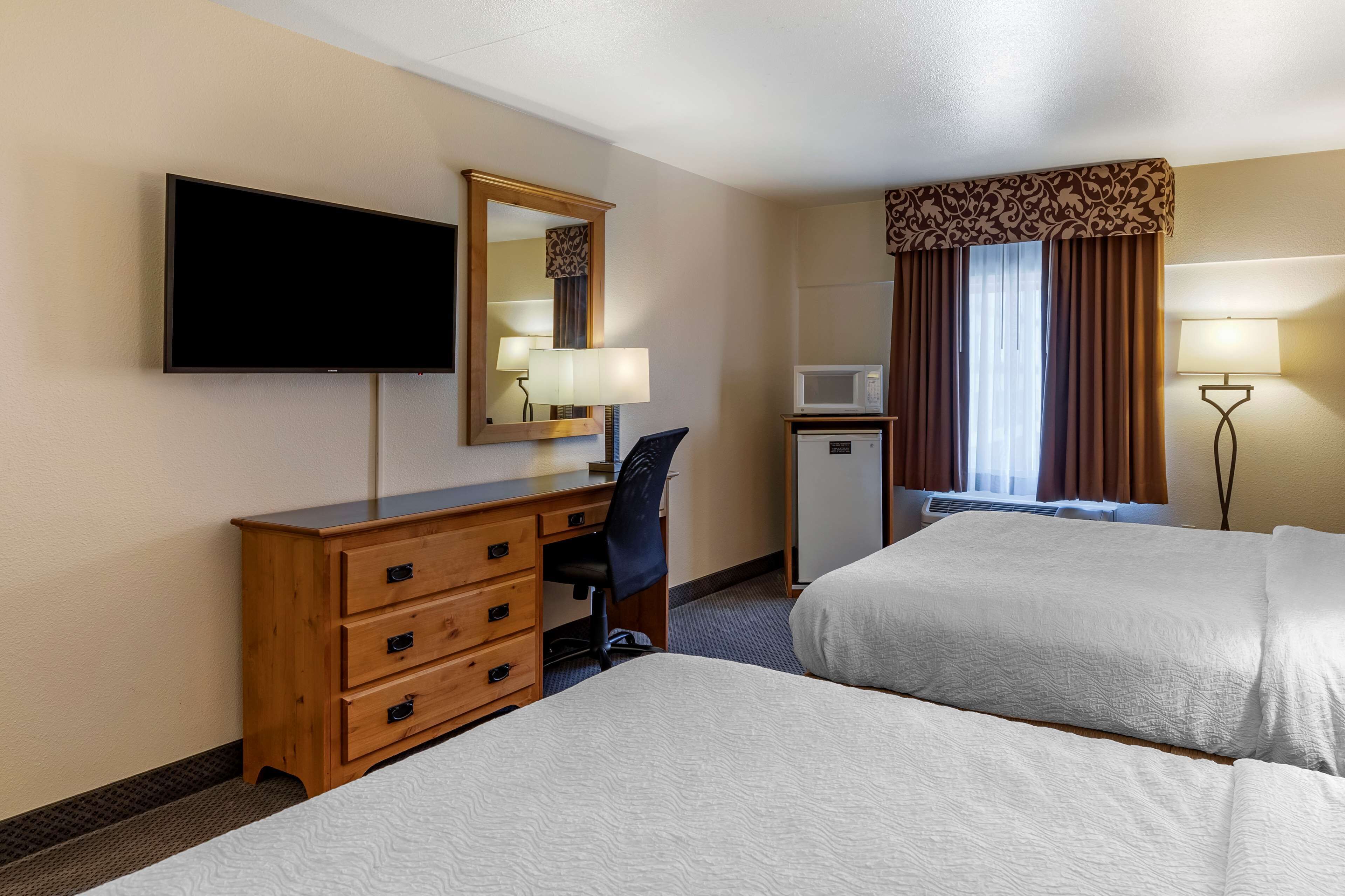 standard room, 2 queen beds, non smoking, refrigerator & microwave | desk, iron/ironing board, free cots/infant beds, free rollaway beds