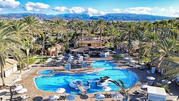 2 outdoor pools, pool umbrellas, pool loungers