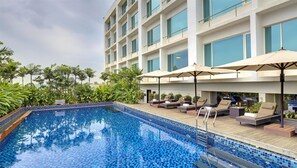 Outdoor pool, pool umbrellas, pool loungers