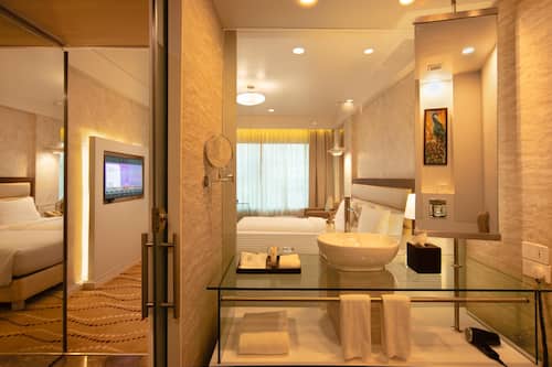 Shower, eco-friendly toiletries, hair dryer, bathrobes