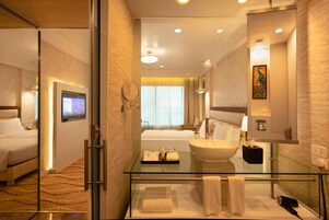 Shower, eco-friendly toiletries, hair dryer, bathrobes