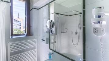 Shower, free toiletries, hair dryer, towels