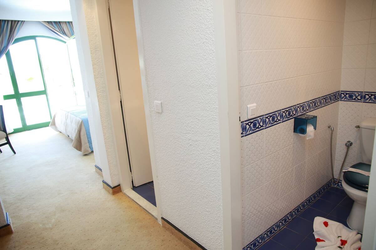 bathtub, free toiletries, hair dryer, bathrobes