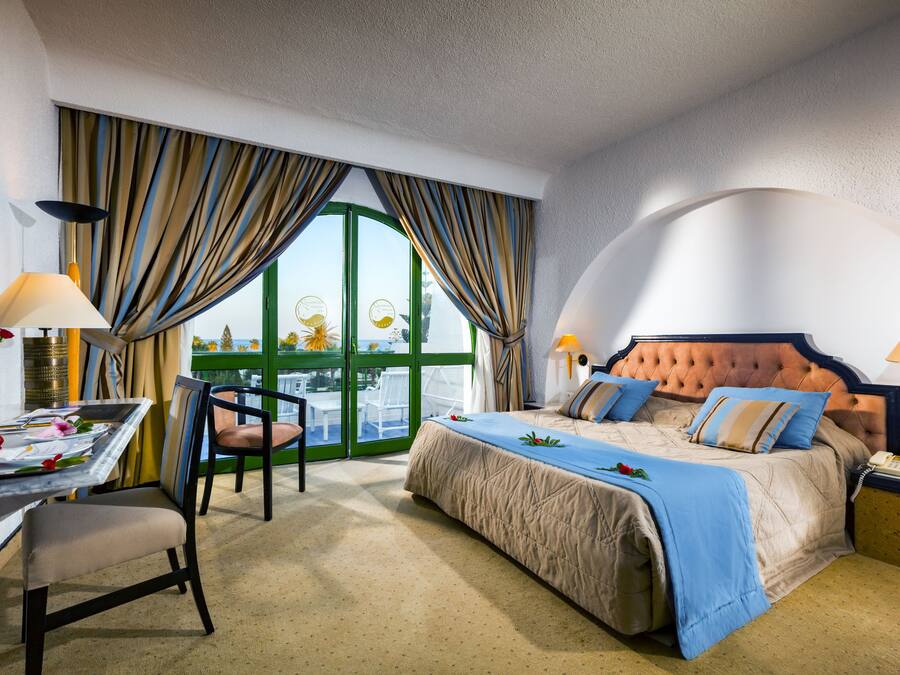 Free minibar items, in-room safe, desk, blackout drapes