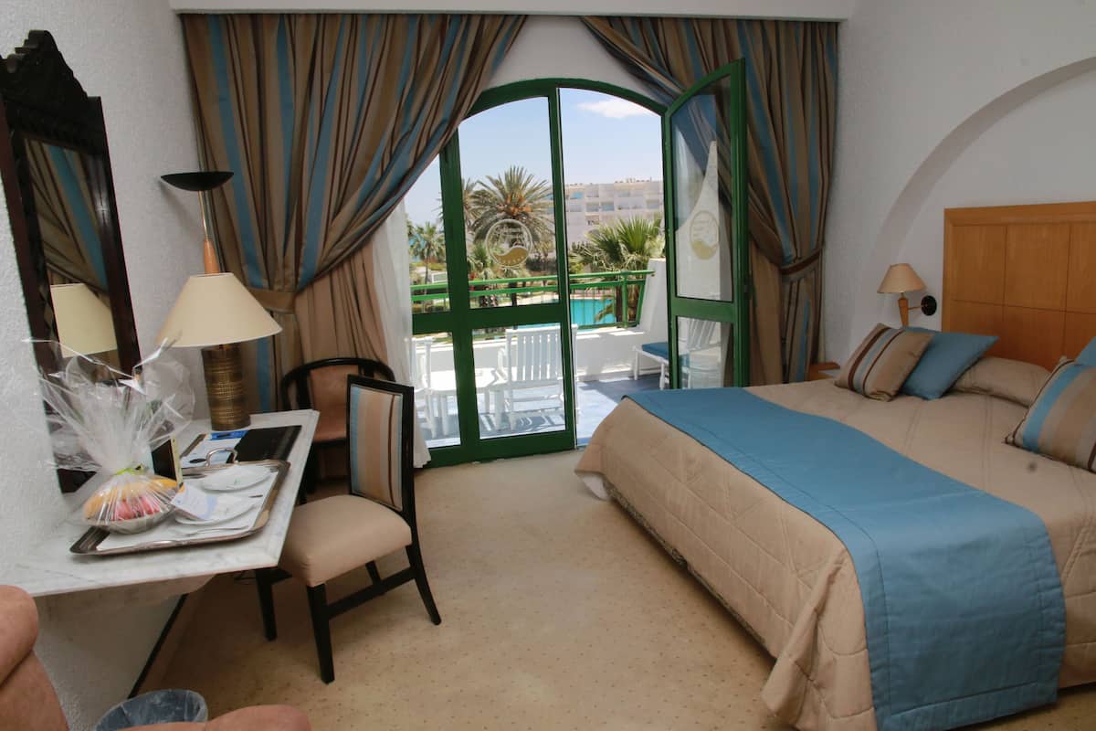 Free minibar items, in-room safe, desk, blackout curtains