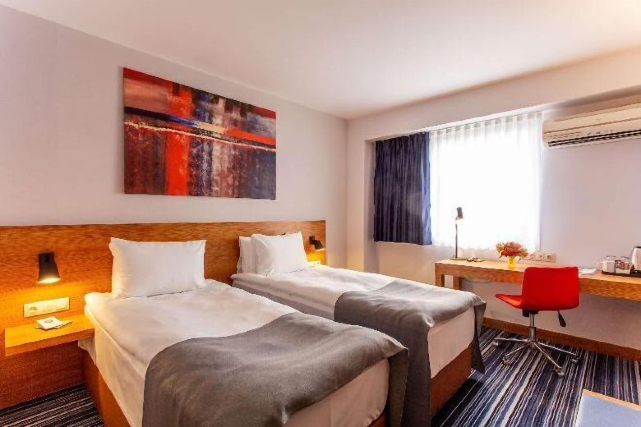 Premium bedding, pillowtop beds, in-room safe, individually decorated