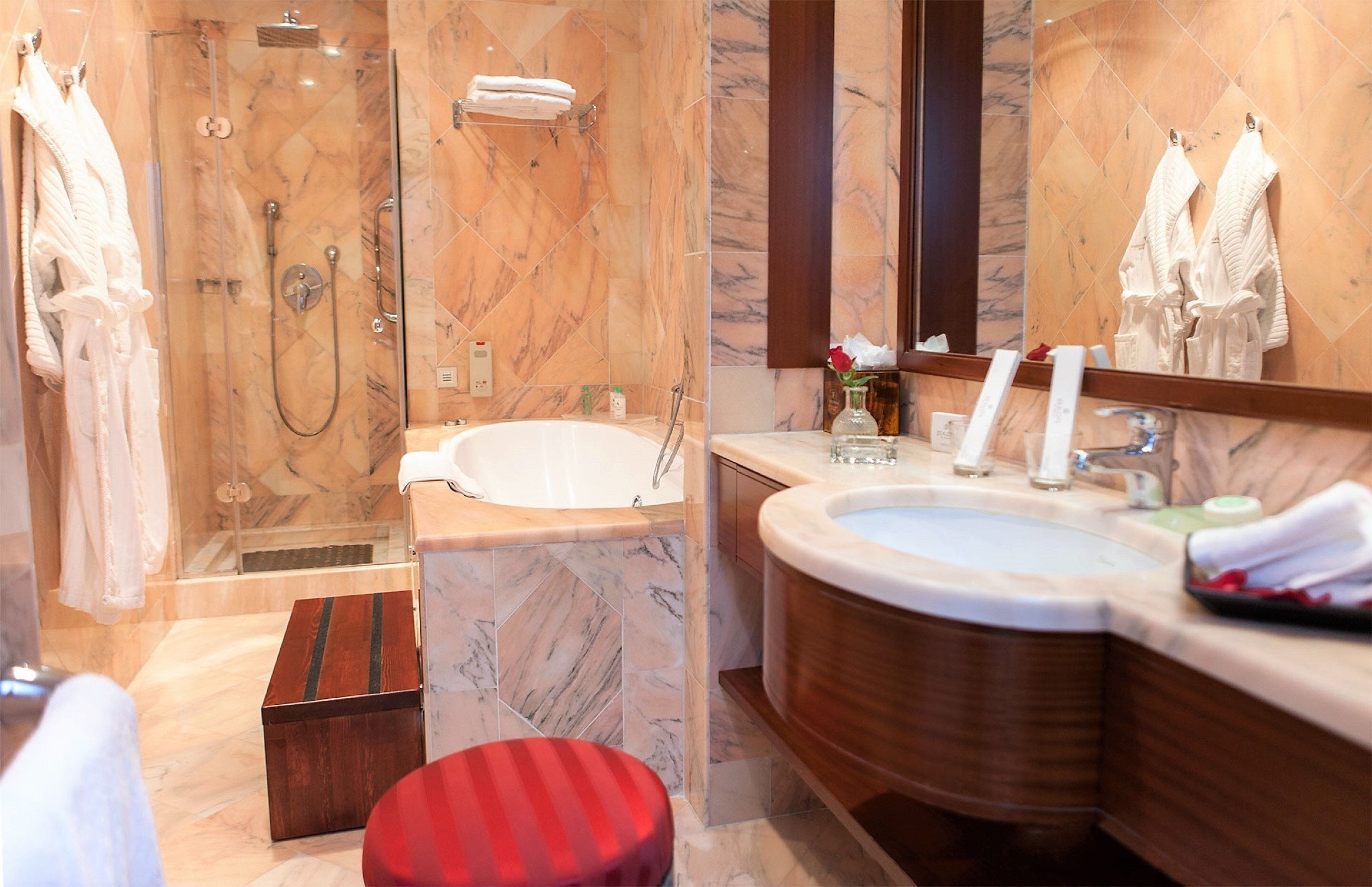 deep-soaking bathtub, free toiletries, hair dryer, bathrobes