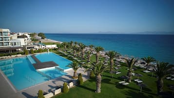 Indoor pool, seasonal outdoor pool, pool umbrellas, sun loungers