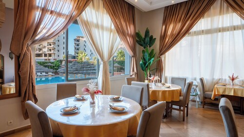Intouriste Hôtel & Suites