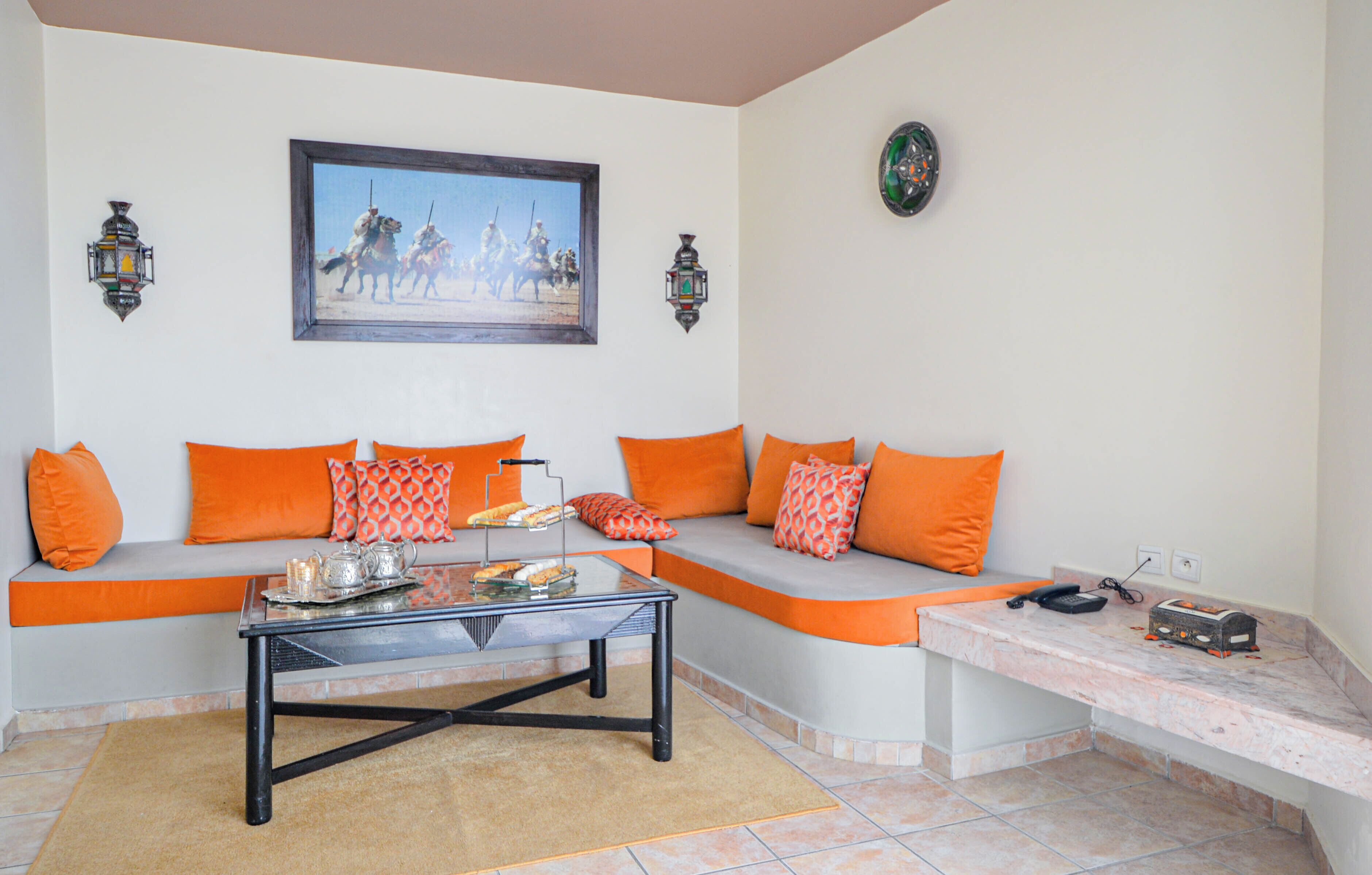 Deluxe-Apartment | Wohnbereich | LCD-Fernseher