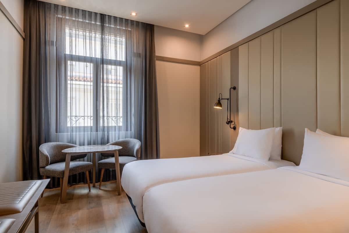 Standard Room, 2 Twin Beds, Non Smoking | Minibar, in-room safe, desk, free cribs/infant beds