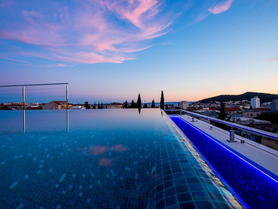 Seasonal outdoor pool, pool umbrellas, sun loungers