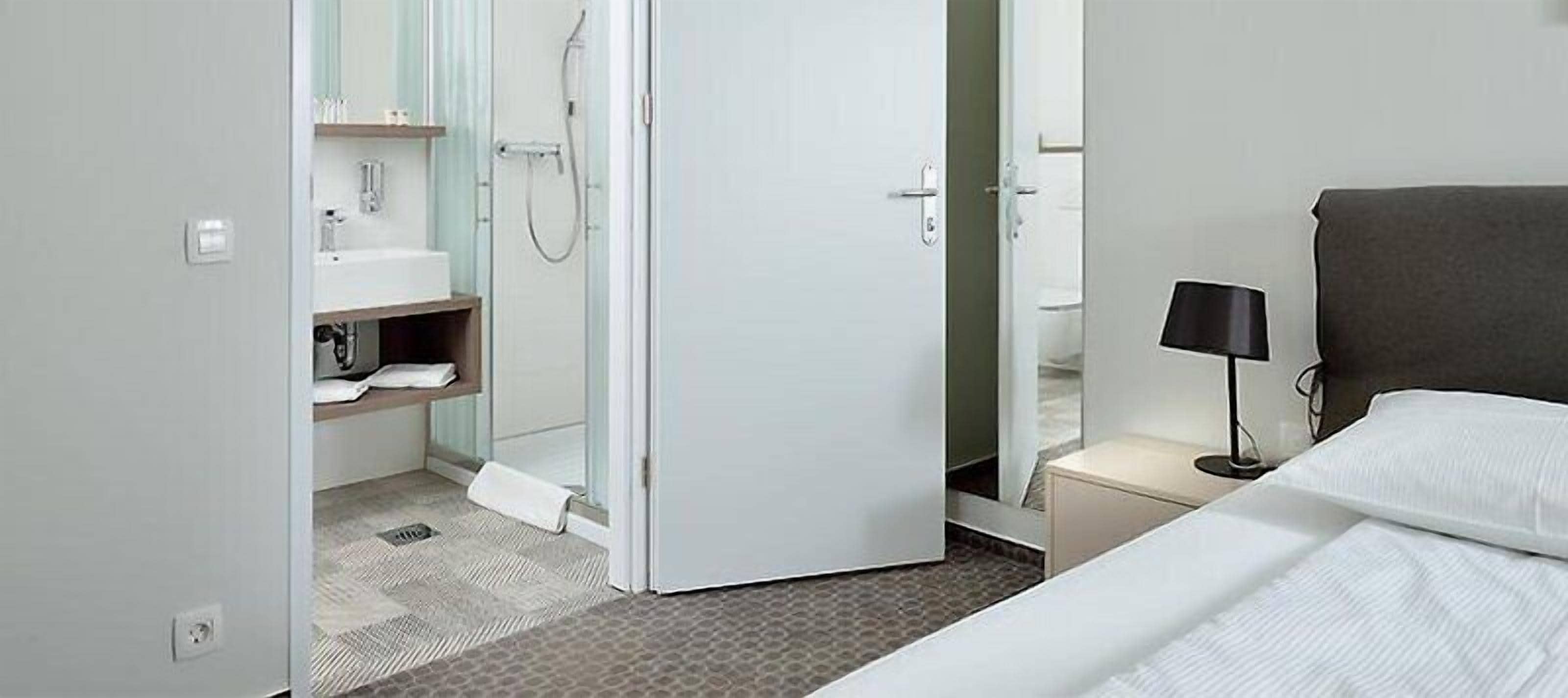 Hypo-allergenic bedding, desk, blackout curtains, iron/ironing board