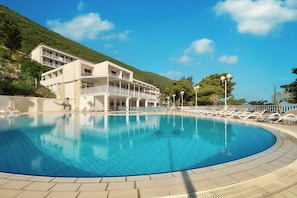 Seasonal outdoor pool, open 10:00 AM to 7:00 PM, sun loungers