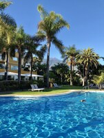 Outdoor pool, open 7:00 AM to 7:30 PM, pool umbrellas, sun loungers