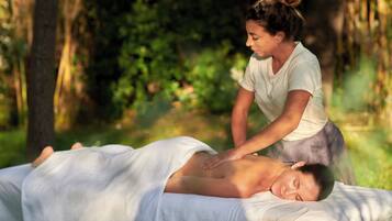 Experience a soothing massage amidst lush greenery.