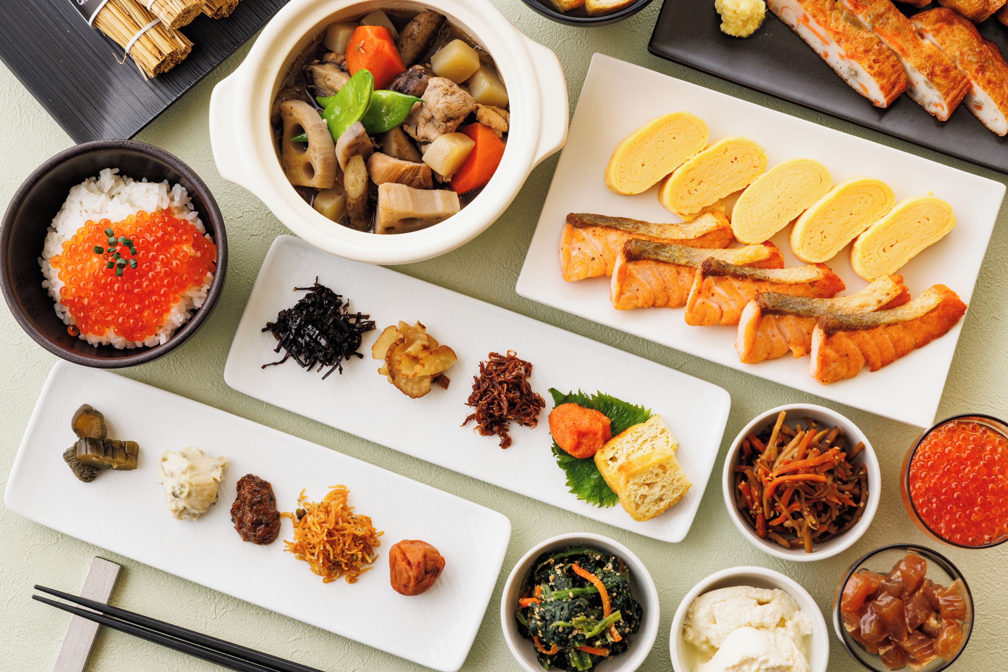 A variety of Japanese dishes arranged on a table.