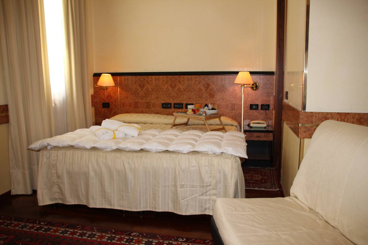 Standard Triple Room, 1 Double Bed with Sofa bed | Living area | TV, DVD player, pay movies