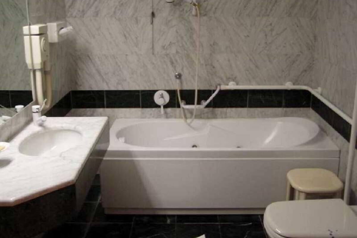 Bathroom | Hair dryer, bidet, towels