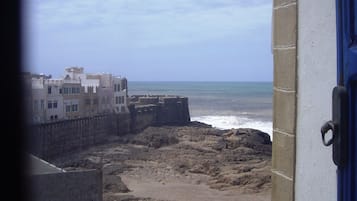 Enjoy breathtaking views of the sandy beach and the sea from the comfort of your room.