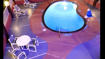 Outdoor pool, open 10:00 AM to 10:00 PM, sun loungers