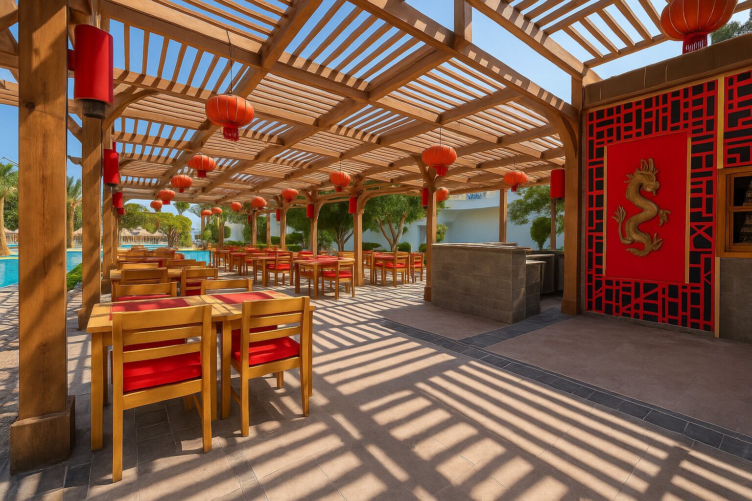 An outdoor dining area with wooden tables and chairs, red cushions, and a red decorative wall with a golden dragon.