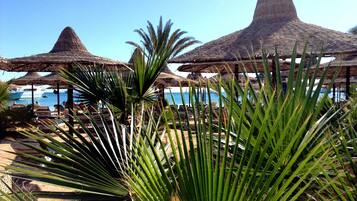 Private beach, sun-loungers, beach umbrellas, beach towels