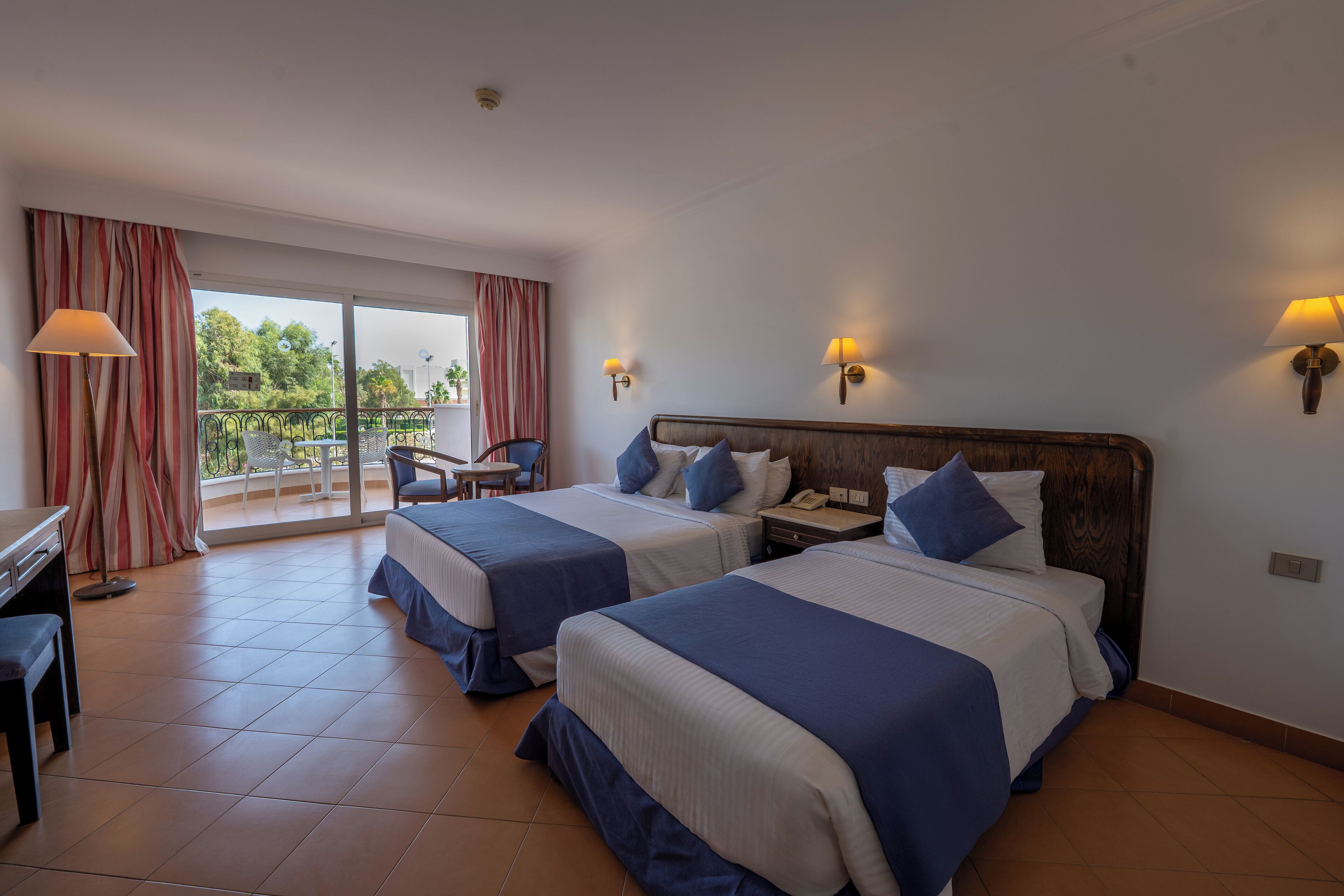 Family Room, Garden View (Deluxe, Queen or Twin) | Minibar, in-room safe